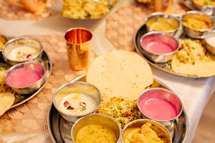 Traditional Indian thali spread laid out for a family gathering